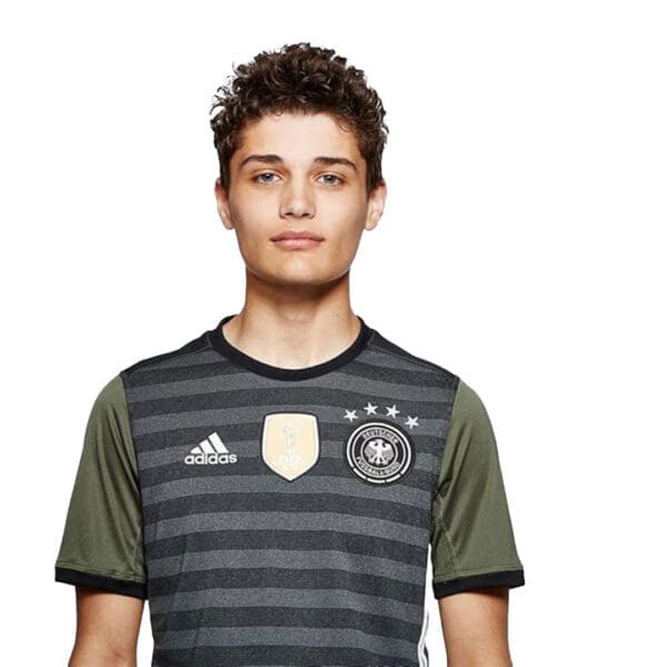 Man wearing a German soccer jersey.