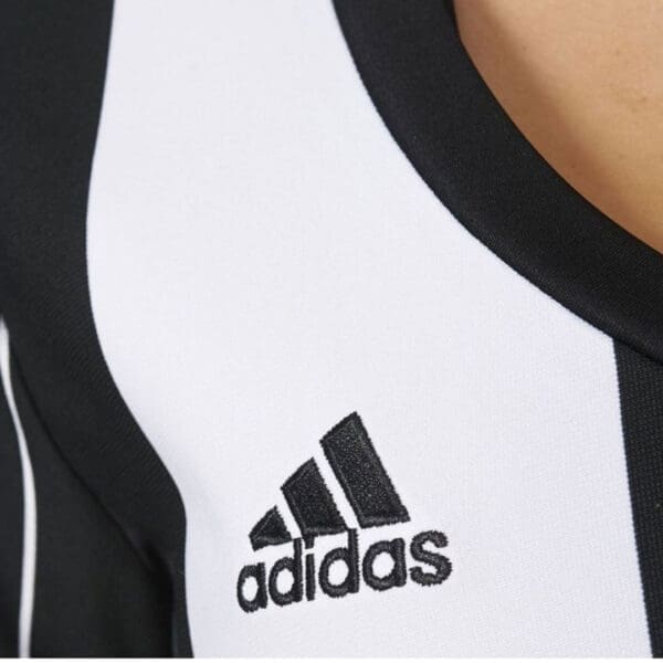 Black and white adidas jersey.