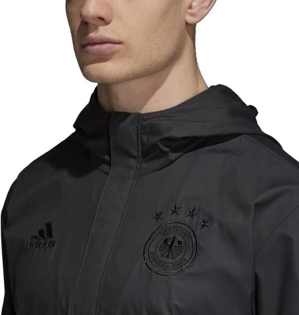 Black Adidas Germany soccer jacket.