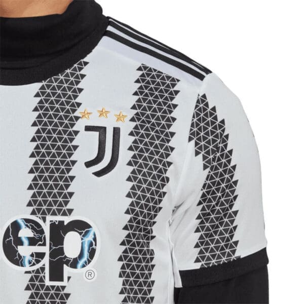 Juventus soccer jersey with black and white pattern.