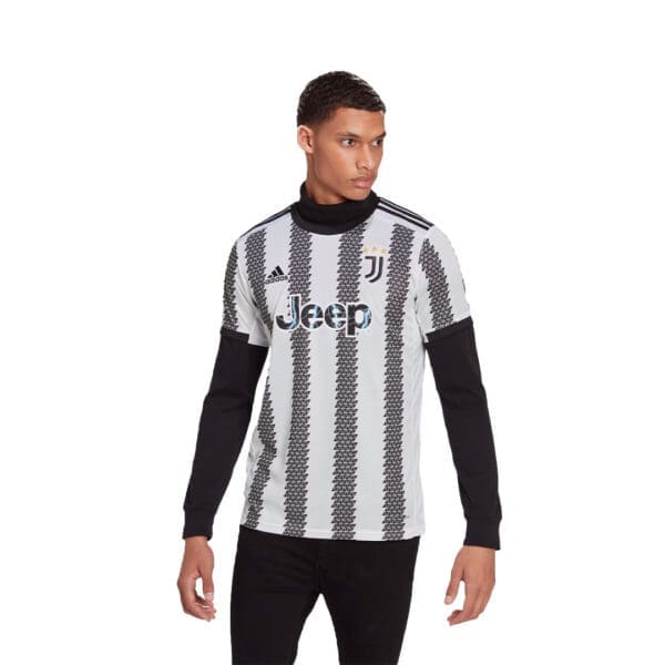 Man wearing a Juventus soccer jersey.