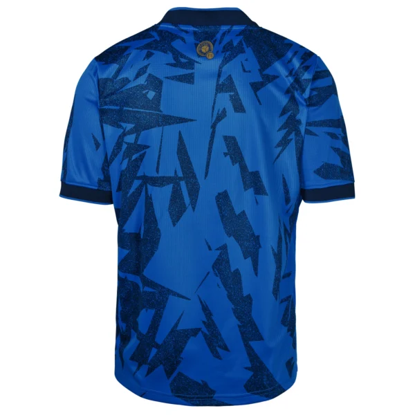 Blue soccer jersey with black pattern.