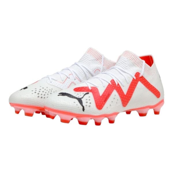 White and red Puma football boots.