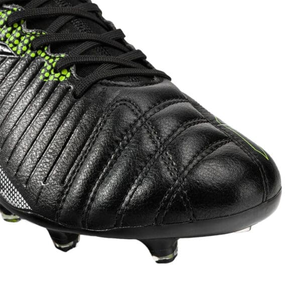 Black leather soccer cleats with green accents.