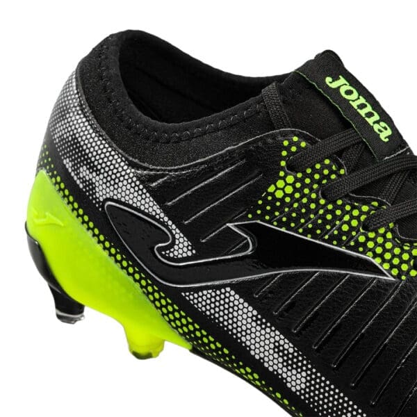 Black and neon green Joma soccer cleat.