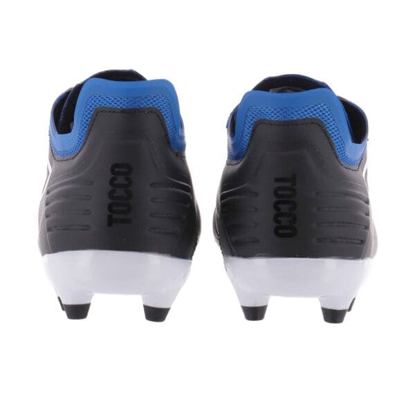 Black and blue soccer cleats, back view.