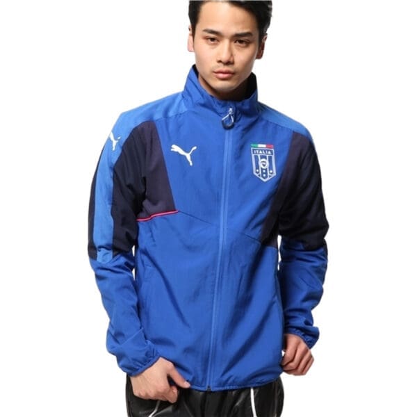 Man wearing blue Italian Puma jacket.