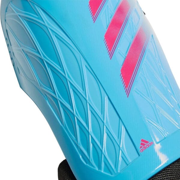 Blue and pink Adidas shin guards.