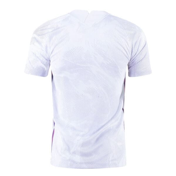 White short-sleeved soccer jersey with purple accents.