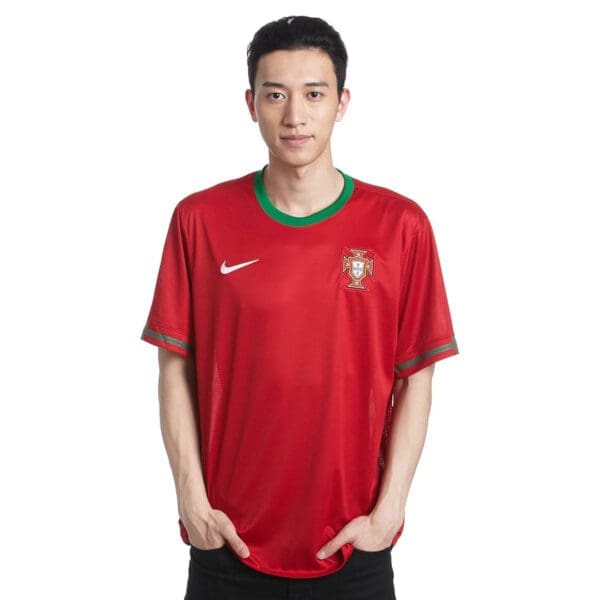 Man wearing Portugal soccer jersey.