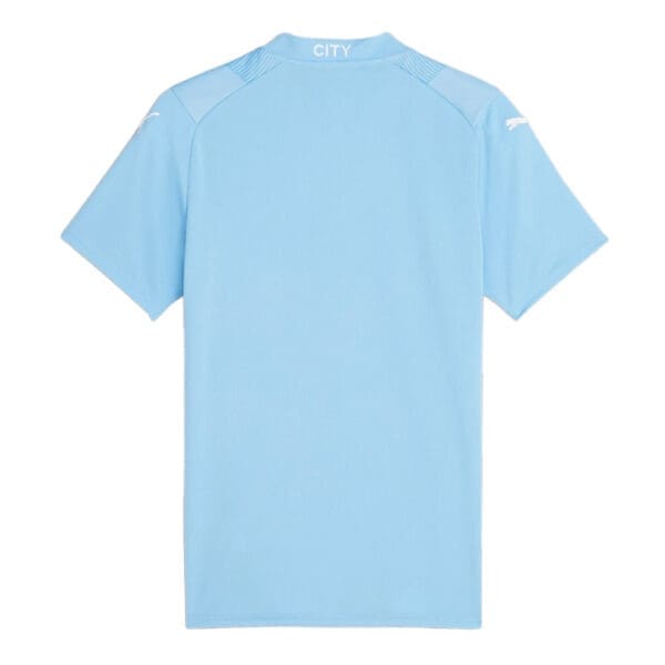 Light blue soccer jersey with "CITY" on the back.