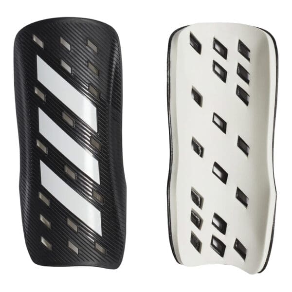 Adidas soccer shin guards, black and white.