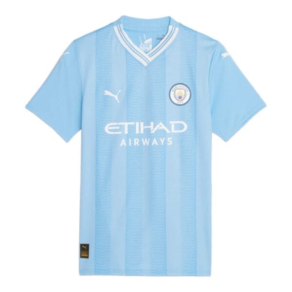 Manchester City soccer jersey with Etihad Airways logo.