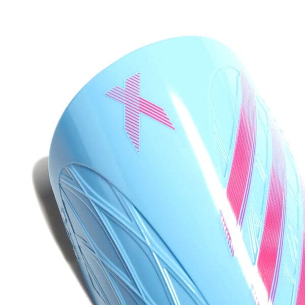 Blue and pink football shin guard.