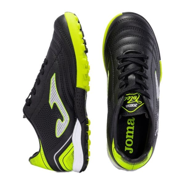 Black and yellow Joma soccer cleats.