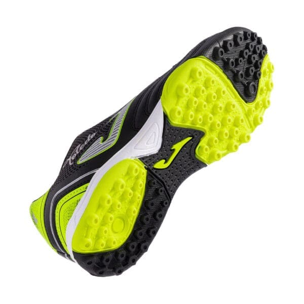 Black and yellow soccer shoe sole