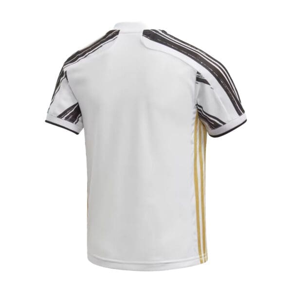 White soccer jersey with black and gold details.