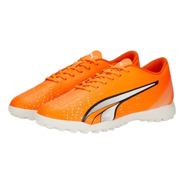 Orange and black Puma soccer cleats.