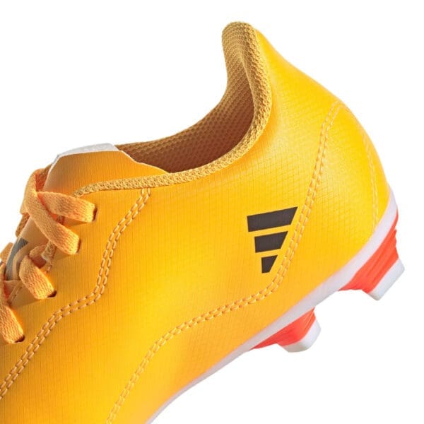 Yellow Adidas soccer cleat with black logo.