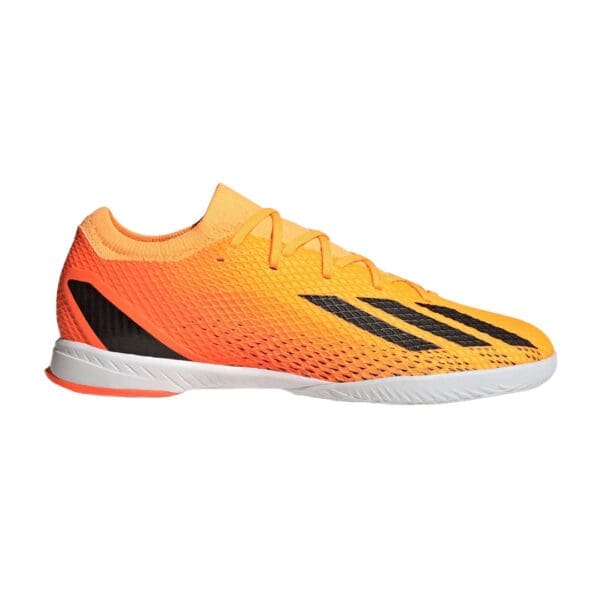 Orange and black Adidas soccer shoe.