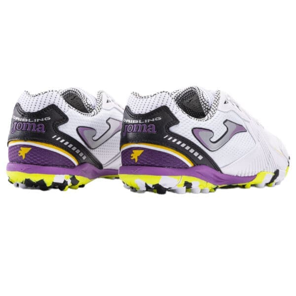 White and purple Joma Dribbling soccer cleats.