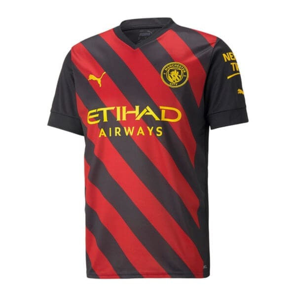 Manchester City soccer jersey, red and black stripes.