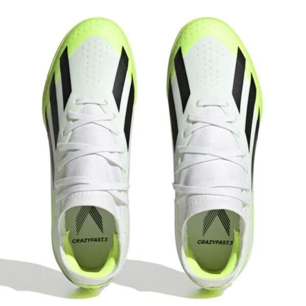 White and yellow Adidas Crazyfast 3.3 soccer cleats.