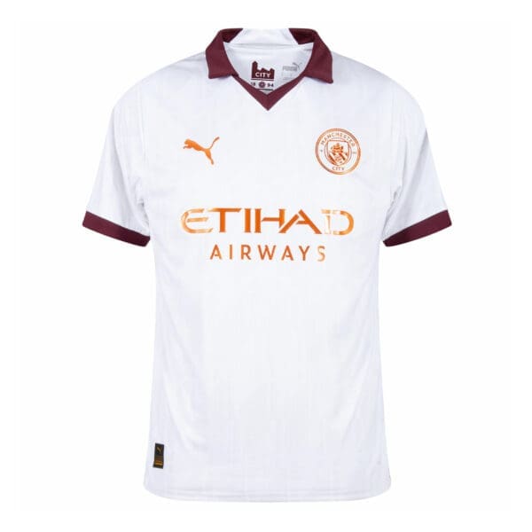 Manchester City soccer jersey with Etihad Airways logo.