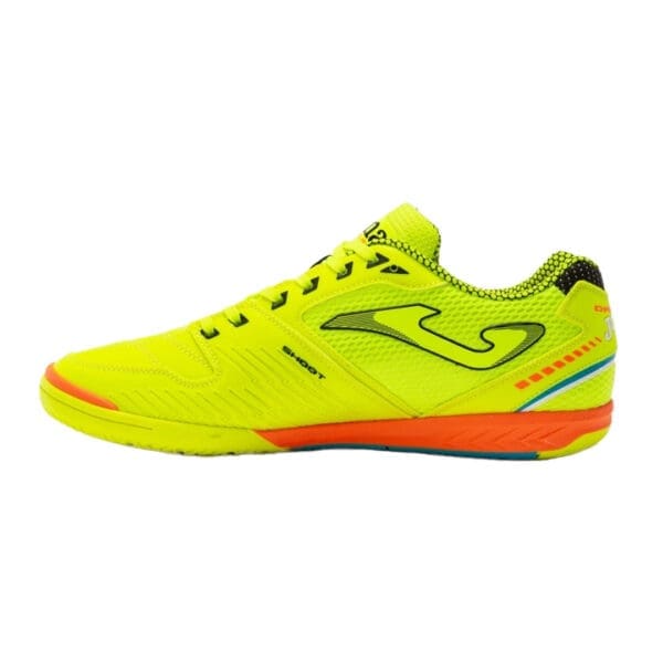 Yellow indoor soccer shoe with orange accents.