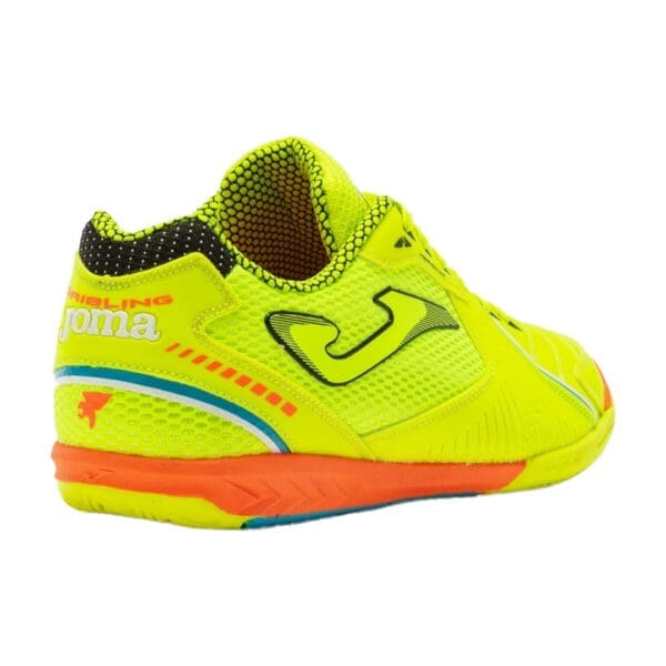 Yellow and orange Joma indoor soccer shoe.