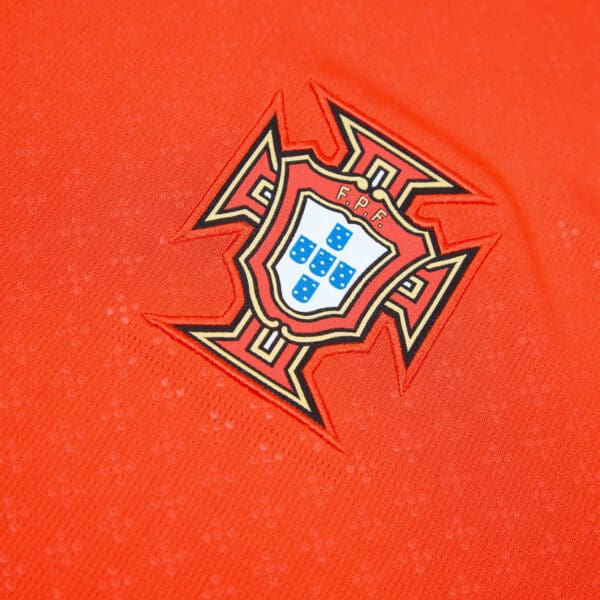 Portugal national team crest on jersey.