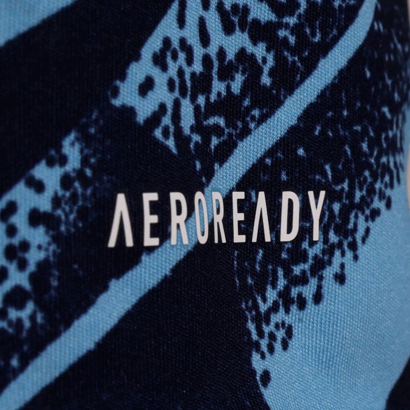 AEROREADY logo on textured fabric background.