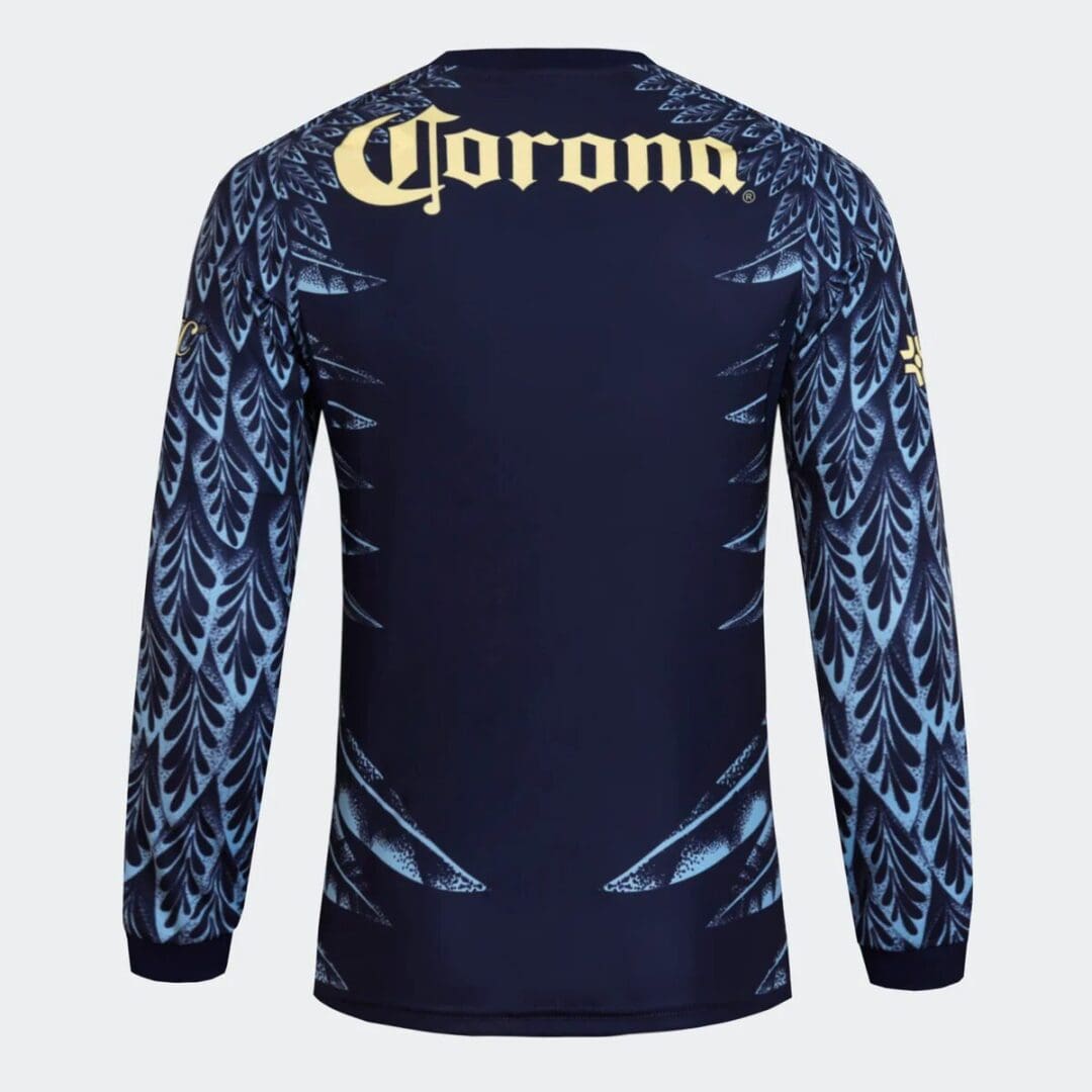 Blue long-sleeve shirt with decorative patterns.